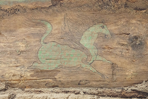 ◎ 這是在實驗室考古方艙內拍攝的墓葬M20出土的木棺座壼門內的彩繪「翼馬」圖案(二月一日攝)。(新華社記者李賀 攝)